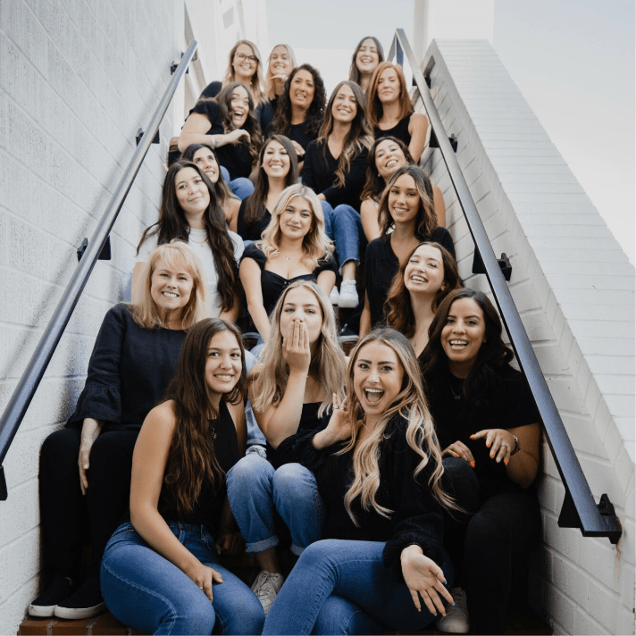 people sitting on a stairwell